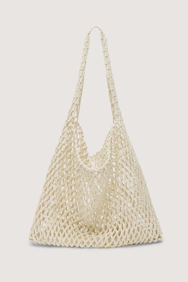 A cream-colored woven shoulder bag with a single long strap, photographed against a white background.