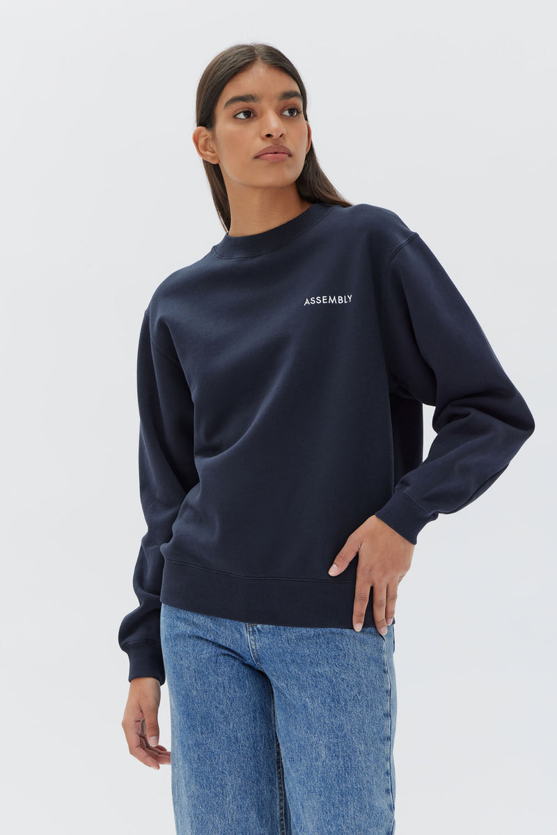 Womens Pax Logo Fleece True Navy Assembly Label