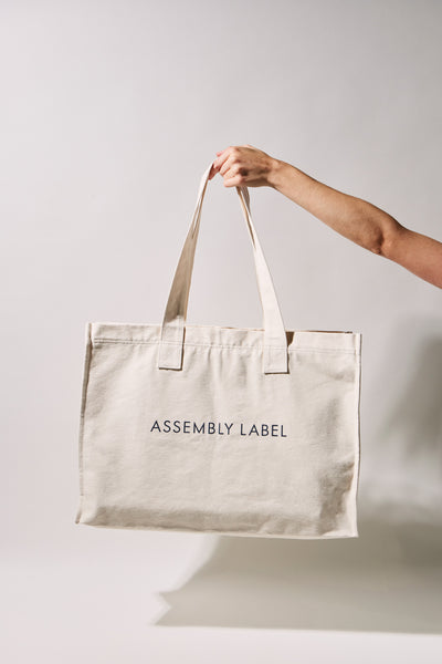 Assembly label 2025 tote bag black