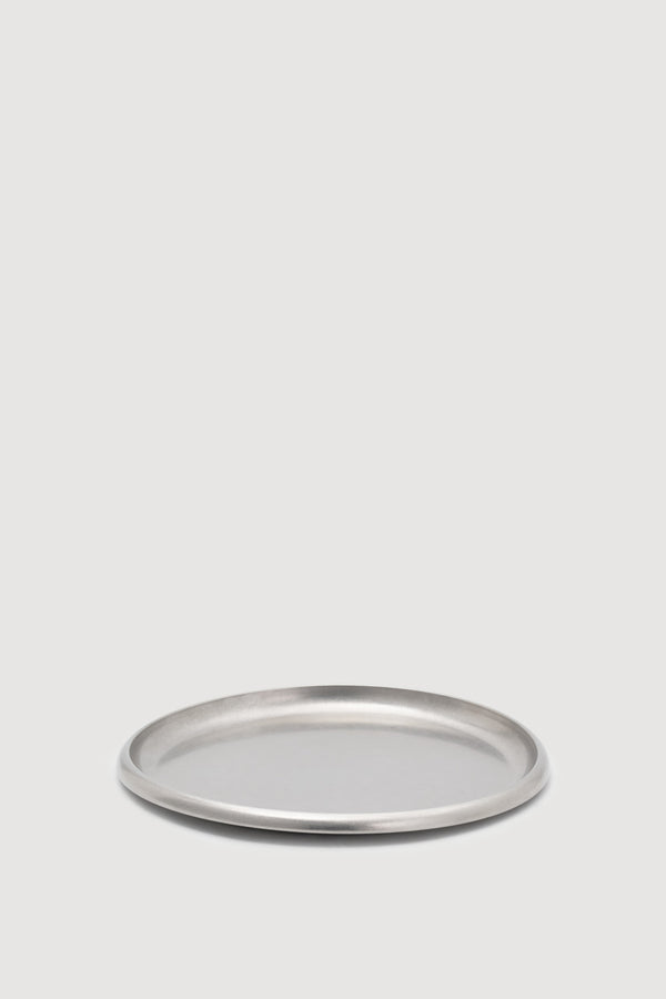 Service project round stainless steel tray with a brushed finish against a white background.