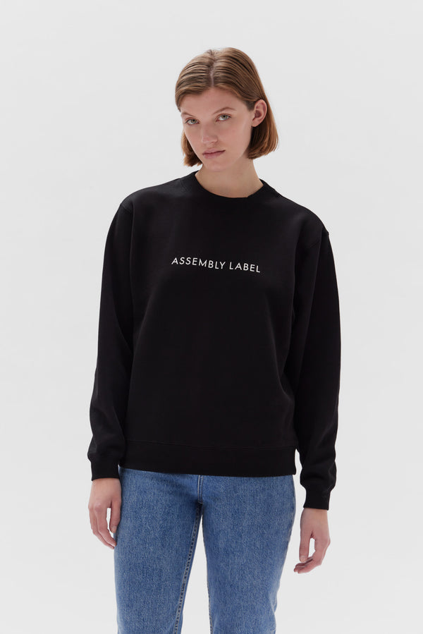 Assembly label 2025 black jumper